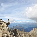 Man on top of mountain